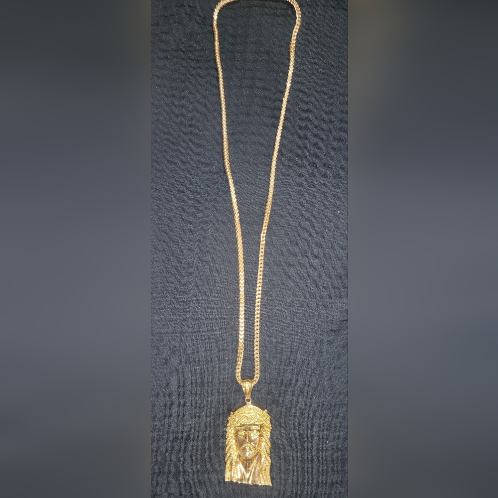 10kt gold necklace  10kt gold religious pendant with clear and yellow diamonds